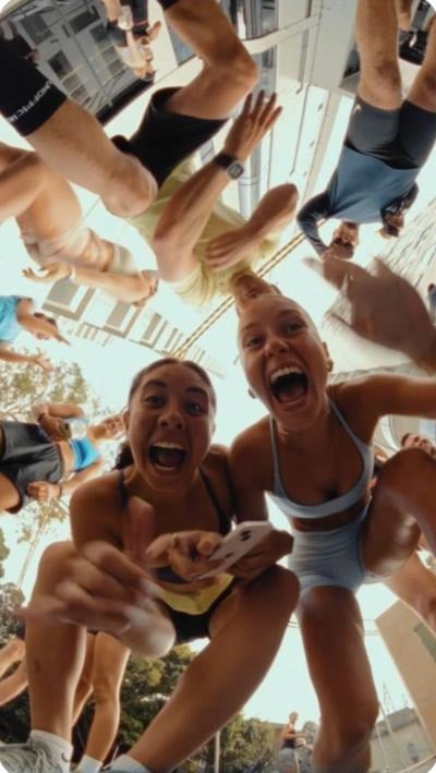 Friends laughing, seen from below