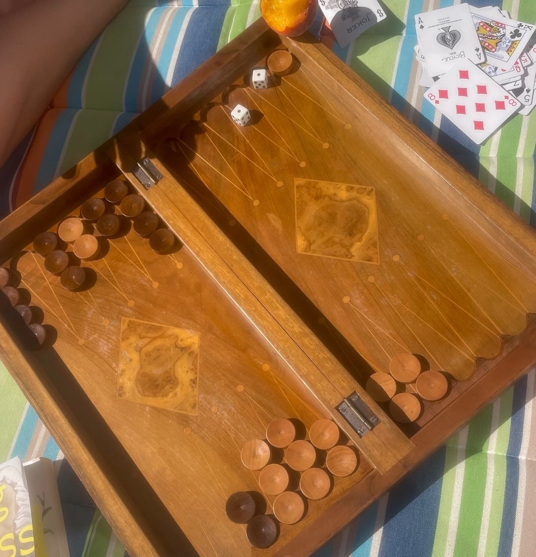 A backgammon board on a table