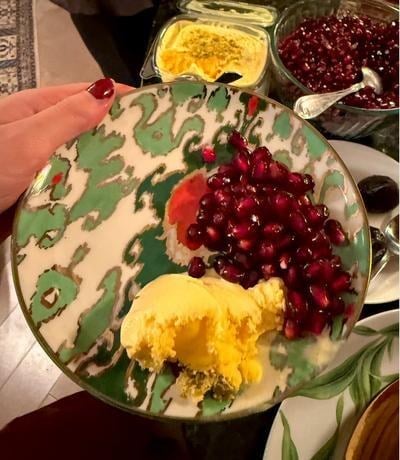 A plate of pomegranate and eggs